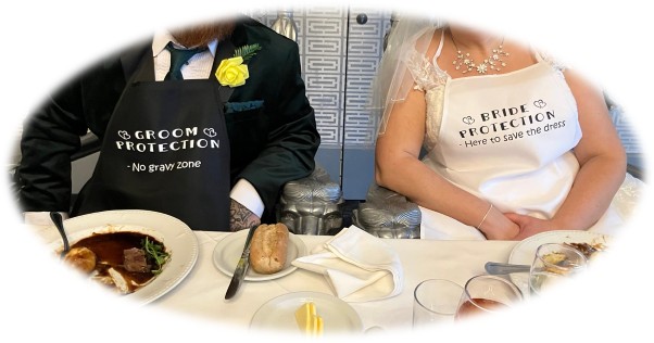 His & Her Aprons £12